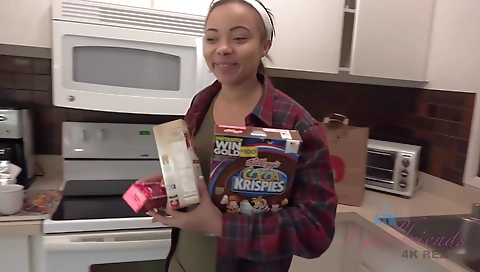 Ebony woman in sexy outdoor clothes plays with her tits