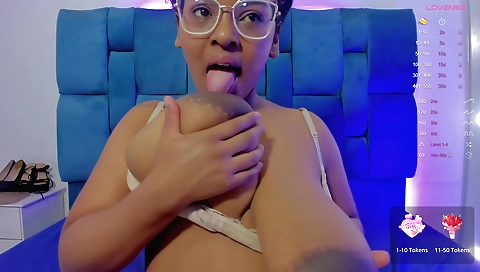 Ebony teen makes solo video on camera and sucks herself