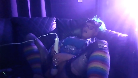 Chubby ebony woman smoking a pipe and taking a dildo