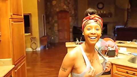 Sexy ebony pornstar showing her tattooed pussy on cam