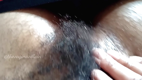 Ebony amateur hussy plays with her natural hairy pussy