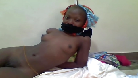 Ebony blonde gagging on a long shaft on her webcam