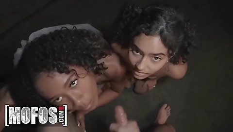 Ebony brunette sharing a big cock with her friends