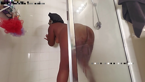 Ebony babe has sex in front of a mirror and a shower