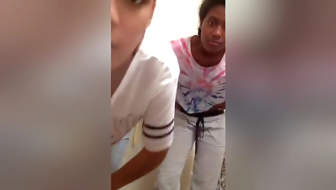 Ebony teen plays with her pussy in tight pants and white blouse