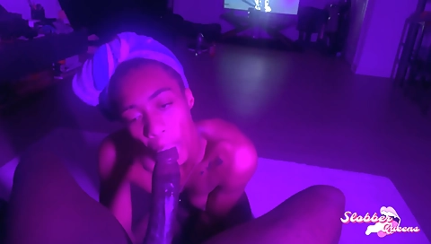 Ebony teen with a tattooed pussy deepthroat in a video