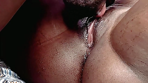 Amateur black man and a black woman in amateur cunnilingus