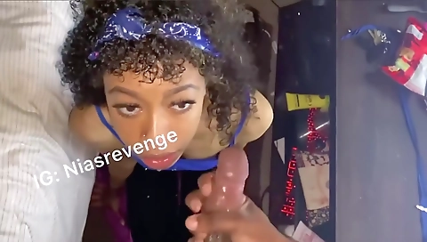 Ebony girl gives a blowjob to her boyfriend's big cock