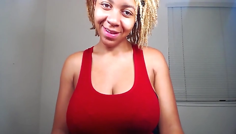 Ebony chick in sexy lingerie flashing big boobs on webcam