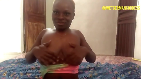 Horny ebony woman is showing off her sexy body on webcam